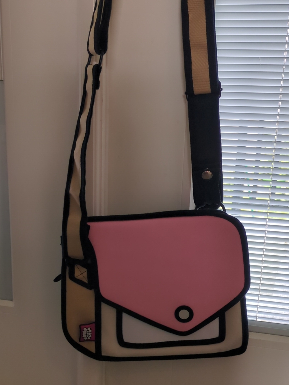 Jump From Paper Crossbody Bag